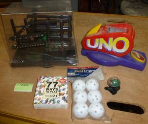 lot 156 image: Lot of games, marble game, Uno Blast(cards inside) and more