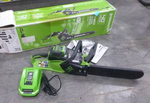 lot 186 image: 40 volt Greenworks chainsaw with battery and charger