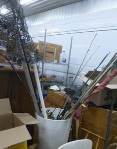 lot 219 image: bucket of fishing poles