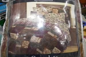 lot 281 image: Cabin Comforter (used) and new shams and bedskirt