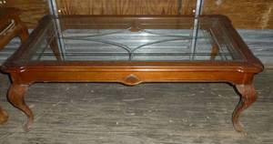 lot 310 image: Nice coffee table with glass top 28x50x17t