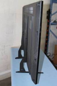 lot 15 image: Samsung DB55E 55 HD 1080p Television  TV  Commercial-Grade Display  Monitor with Table Stand & Remote Control