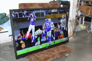 lot 55 image: Sharp Aquos 70 Full 1080p HD LED Smart Television  TV  Display  Monitor w Built-in Wi-Fi - Model LC-70LE640U