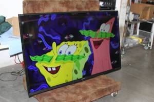 lot 56 image: Sharp Aquos HD 70 Full HD 1080p LED Smart TV Model LC-70LE650U w Built-in Wi-Fi & Dual Core Processor