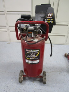 lot 7 image: Coleman 11gal Air Compressor