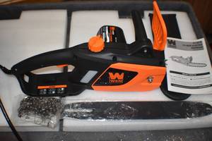 lot 49 image: Electric Chainsaw