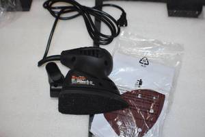 lot 55 image: Palm Sander