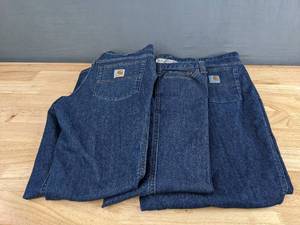 (3) Pair of Womens Carhartt Jeans (Sizes 2, 4 Tall, and 24) J