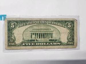 lot 77 image: $5 Blue seal silver certificate 1934 Good