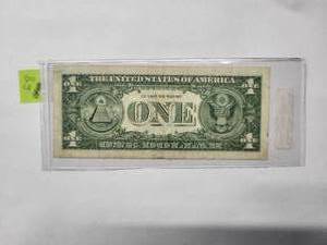 lot 82 image: $ 1Blue Seal  silver certificate  with star  1957    Very Fine