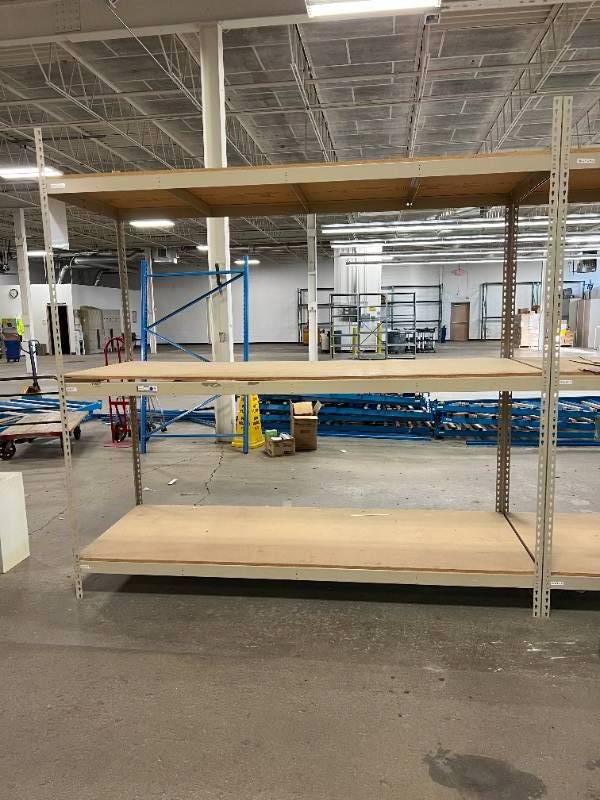 2028 FANTASTIC PALLET RACKING WITH AN ELECTRIC PALLET JACK