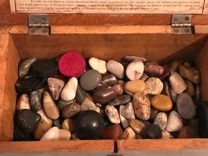 lot 128 image: Wood box of rocks