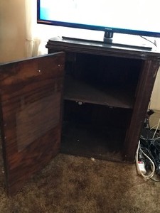 lot 118 image: Vintage sewing machine cabinet with cupboard door