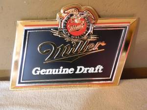 lot 15 image: VINTAGE MILLER GENUINE DRAFT BAR SIGN AMERICAS QUALITY BEER - NICE - AWESOME PIECE - GREAT CHRISTMAS GIFT - APPROX 16 By 11 - SEE PICTURES