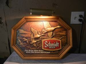 lot 28 image: VINTAGE SCHMIDT BEER THE BREW THAT GREW WITH THE GREAT NOTHWEST WILDLIFE BAR SIGN - NICE - GREAT OLD SCHOOL PIECE - GREAT CHRISTMAS GIFT - APPROX 22 By 17 - SEE PICTURES