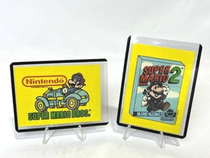 lot 48 image: 1989 Topps Nintendo Super Mario Bros. 2 (#1) Game Sticker Card & 1989 Topps Nintendo Super Mario Bros. (#33) Sticker Card