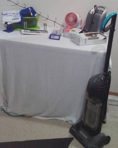 lot 548 image: Misc. Household Items. Fan, Heater, Surge Protector And More.