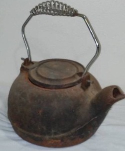 lot 551 image: Cast Sad  Irons, Kettle And More.
