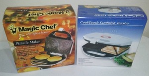 lot 601 image: Pizzelle Maker And Sandwich Toaster With Boxes.