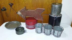 lot 685 image: Metal Decor (7) Cans, Arrow, Planter And More.