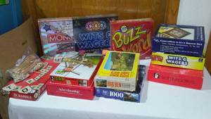 lot 718 image: New Games And More. Buzz Word, Wits And Wagers, America Monopoly, See Pics.
