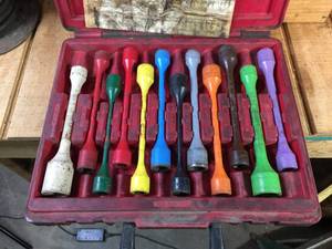lot 52 image: 12pc Wheel Lug Torque Stick Set