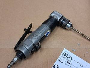 lot 868 image: Chicago Pneumatic 38 Air Reversible Angle Drill CP879