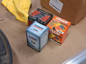 lot 910 image: Lot of (3) Assorted Oil Filters - Fram PH16, Purolator L28252, MicroGuard MGL51085