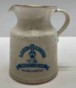 lot 92 image: Vintage Land O Lakes Sweet Cream Mararine Pitcher (With Discontinued Indian Woman Logo)