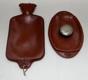 lot 121 image: Antique No. 155 Wearever Oval Ice Cap & Davol Brand 2 12 Qts. Hot Water Bottle