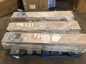 lot 16 image: 10 Boxes of  TrafficMaster Oak Knoll 8 mm T x 7.5 in. W Water Resistant Laminate Wood Flooring (23.7 sqftcase) Customer Returns See Pictures