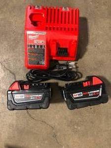 lot 32 image: Milwaukee M18 18-Volt Lithium-Ion XC Starter Kit with Two 5.0Ah Batteries and Charger Customer Returns See Pictures