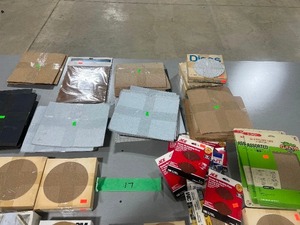 lot 17 image: TABLE FULL OF SAND PAPER SHEETS & DISCS