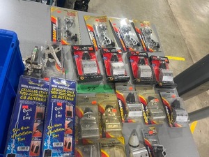 lot 53 image: TABLE FULL OF COMMERCIAL TRUCK ANTENNA MOUNTS