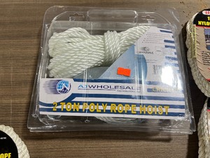lot 90 image: 2 TON POLY ROPE HOIST & 13) 15 X 38 NYLON DOCK ROPES