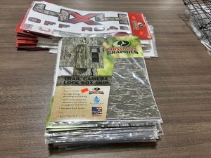 lot 161 image: HUGE LOT OF MOSSY OAK GRAPHICS & TRAIL CAM SKINS