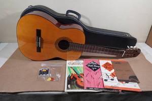 lot 39 image: Alvarez Acoustic Guitar with Case and Accessories