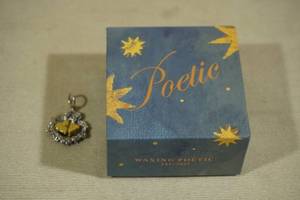 lot 124 image: Waxing Poetic Sterling Silver & Brass 2-Heart Necklace Charm in Gift Box