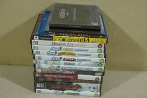 lot 336 image: Assorted Video Games -PC Sims, PC Fallout4, Persona 4 for PS2, Man of Steel Bluray
