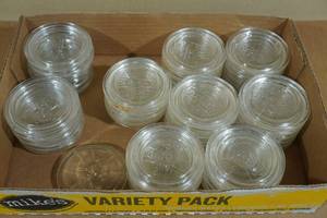 lot 350 image: 54 Glass Canning Jar Lids -42 Atlas, 12 Ball, All 3.25