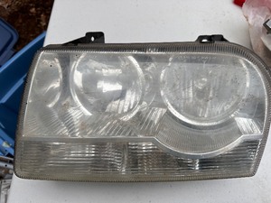 lot 61 image: Chrysler Headlight Assembly