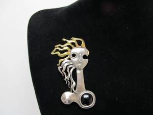 lot 11 image: Large Abstract Figural Brooch Pin