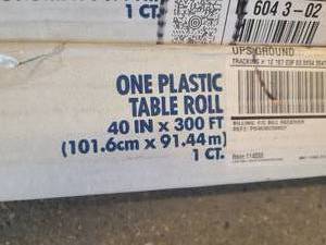 4 Boxes of Plastic Table Rolls 40inx300ft