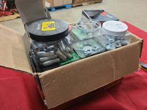 Box of new or partially used hardware for home or shop use