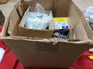 Box of new or partially used hardware for home or shop use