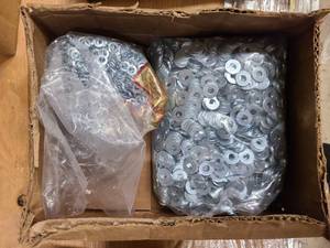Box of new or partially used hardware for home or shop use
