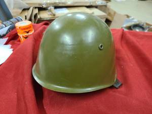 Looks to be a vintage military helmet but no easy identifiers available