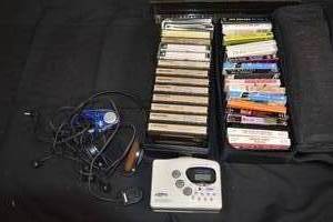 lot 59 image: Assorted Vintage Cassette Tapes with Koss Stereo Cassette Player and Vintage Headphones
