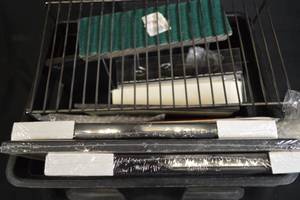 lot 199 image: Crate of Assorted Wall Art and Racks