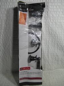 lot 172 image: Delta Porter 3 -Piece Bath Hardware Set with Towel BarRack, Toilet Paper Holder, Hand Towel Holder in Oil Rubbed Bronze